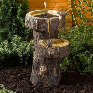 Fuente de baño para pájaros con tronco de árbol con energía solar de Kaleidoscope. .. 